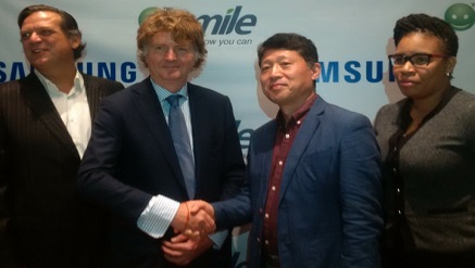 (L-r): Emmanouil Revmatas, director, Information Technology and Mobile, Samsung Electronics West Africa; Michiel Buitelaar, managing director, Smile Communications Nigeria Limited in a warmth handshake with Brovo Kim, managing director, Samsung Electronics West Africa while Alero Ladipo, chief marketing officer, Smile and Tobe Okigbo, chief corporate Services Officer for Smile Communications Nigeria Limited, watch, during the announcement of a partnership between the two companies held in Lagos on Mond